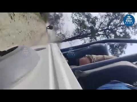 Wild Rhino charges at tourist Jeep, Manas National Park