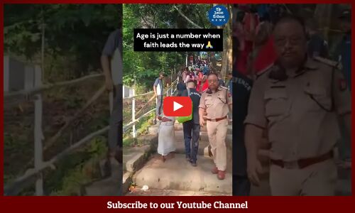 Elderly Woman Climbs Stairs to Kamakhya Temple during Ambubachi