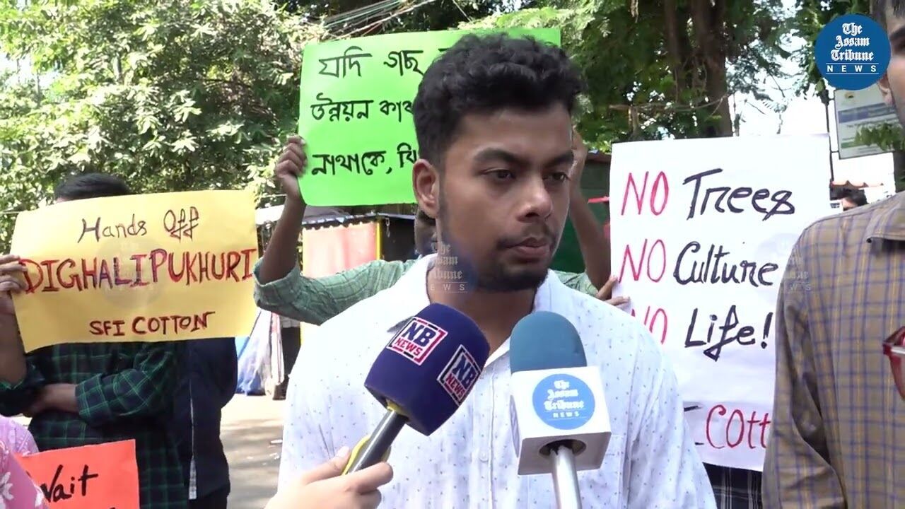 Students protest tree felling for proposed flyover construction at Dighalipukhuri