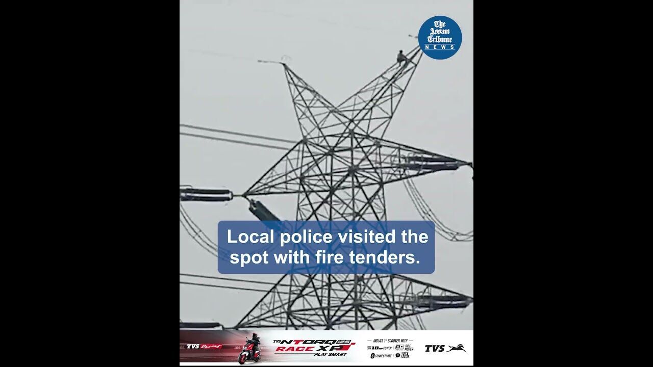 Man climbs up high-tension electricity pole in Bajali